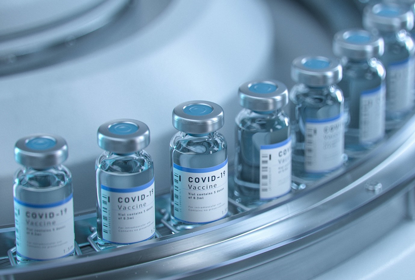 Small glass vaccine ars labelled with "covid"
