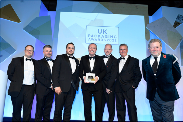 UK packaging Awards attendees accept winners award for Best New Concept